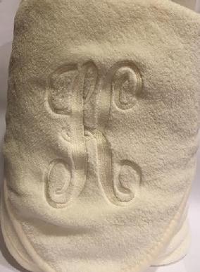 Plush throw with monogram